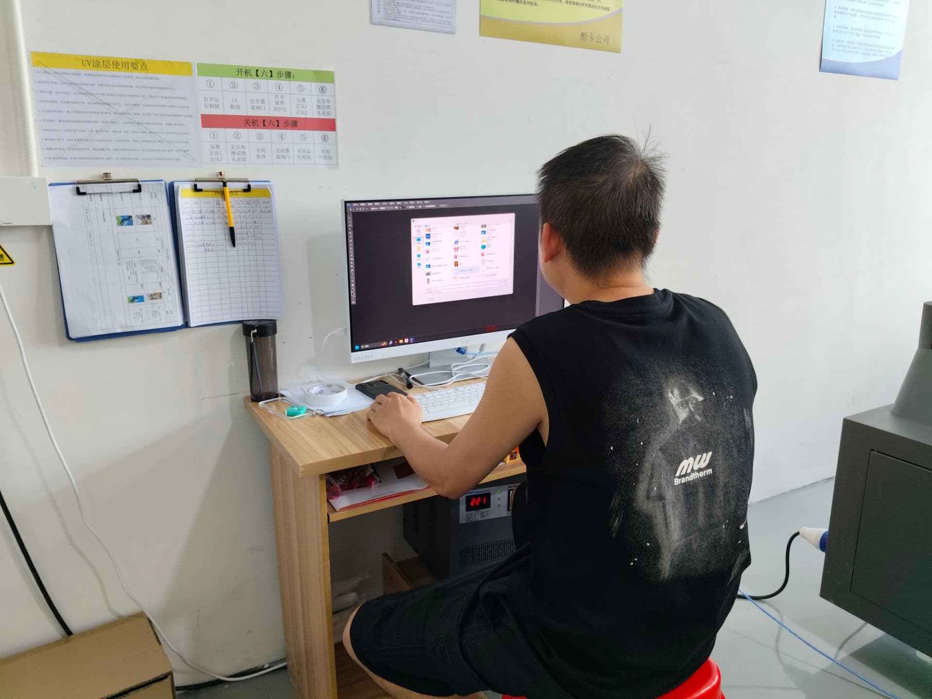 Comfort design team checking custom LED ice bucket artwork before production